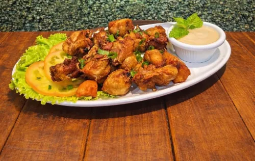 Frango à Passarinho